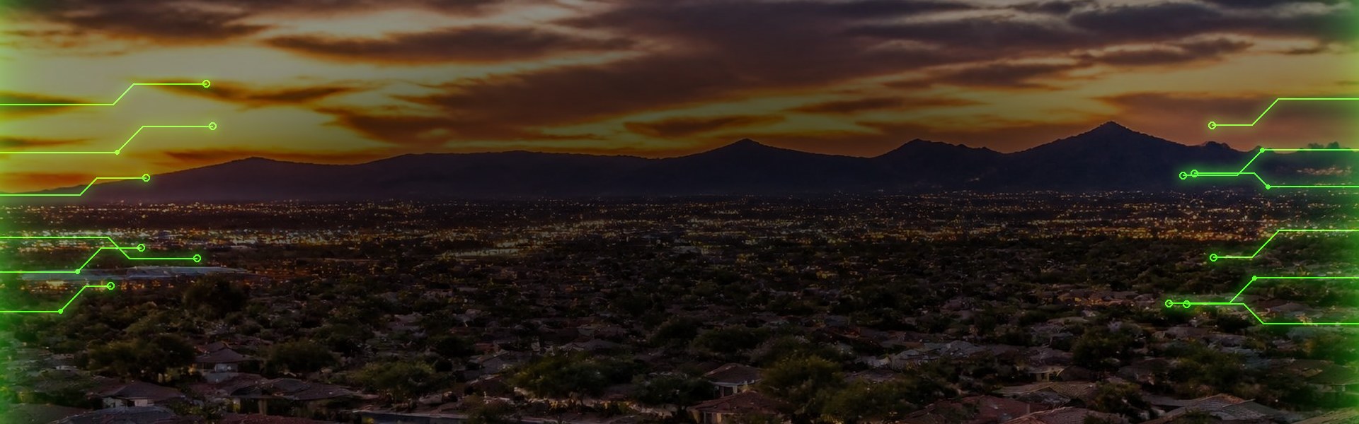 East Valley neighborhood at dusk below the mountains.